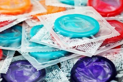 Is gonorrhea transmitted through a condom